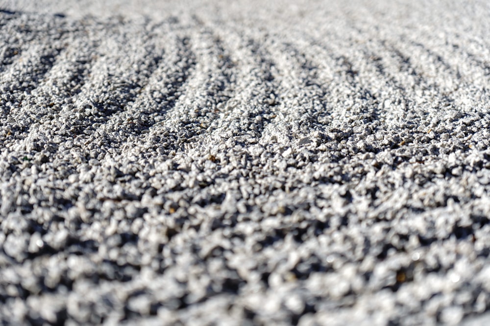 a close up view of a gray rug