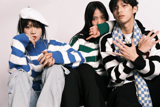 a couple of people sitting next to each other