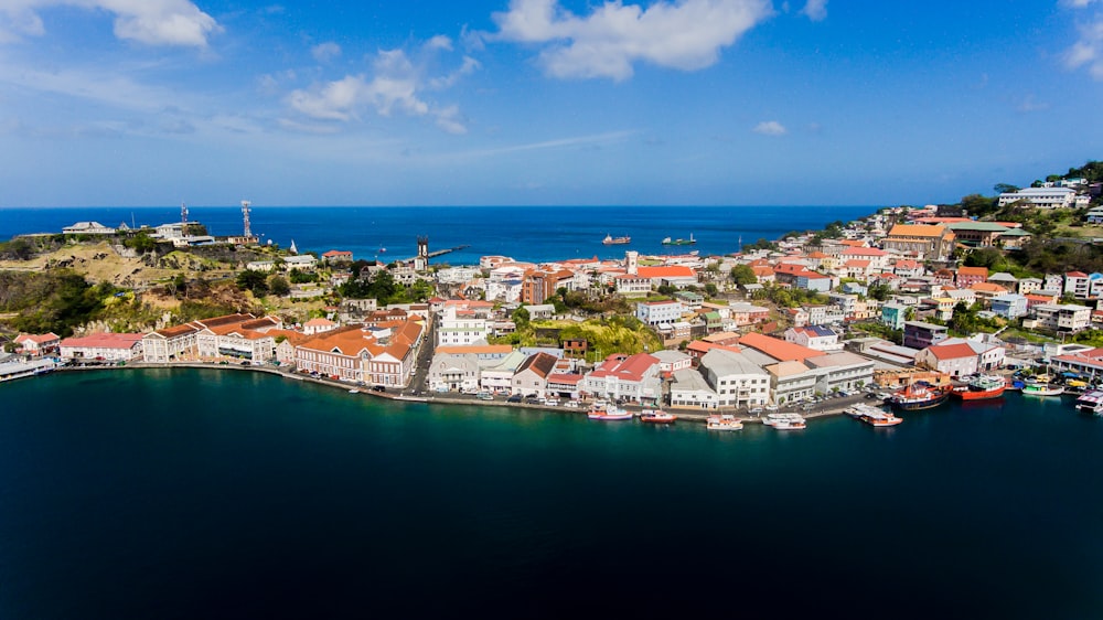 an aerial view of a city by the ocean