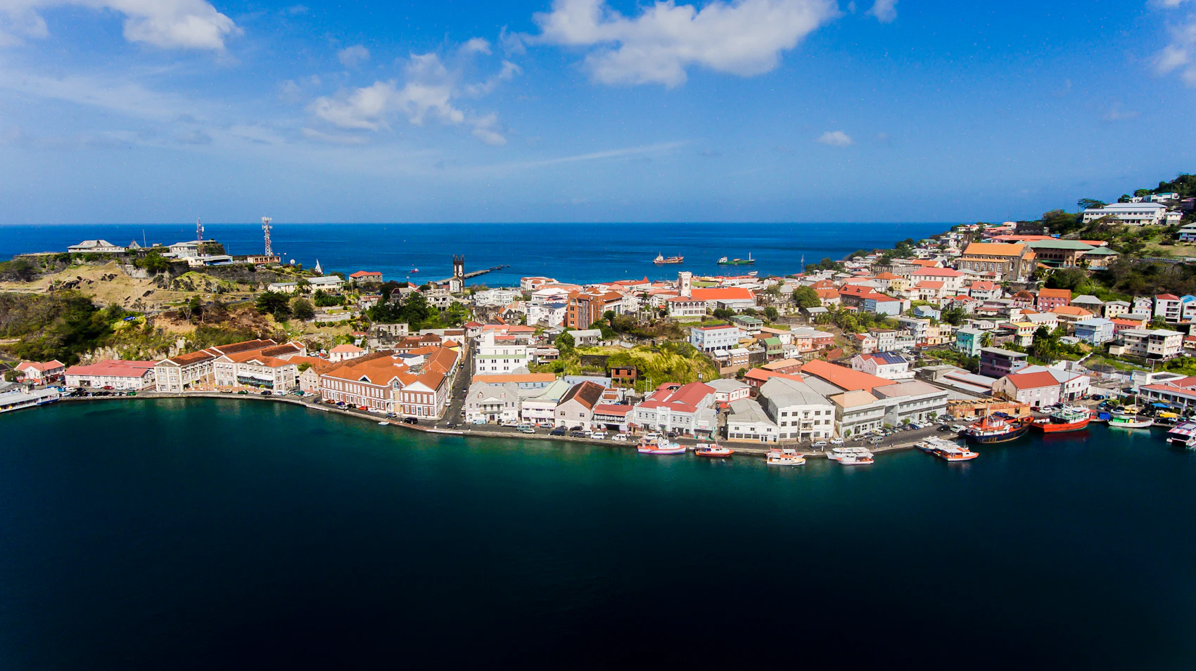 The Carenage and red-roofed buildings of Saint George’s, Grenada