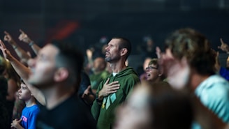 a man standing in front of a crowd of people