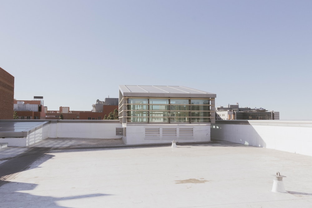 the roof of a building with a building in the background