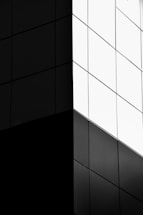a black and white photo of a clock tower