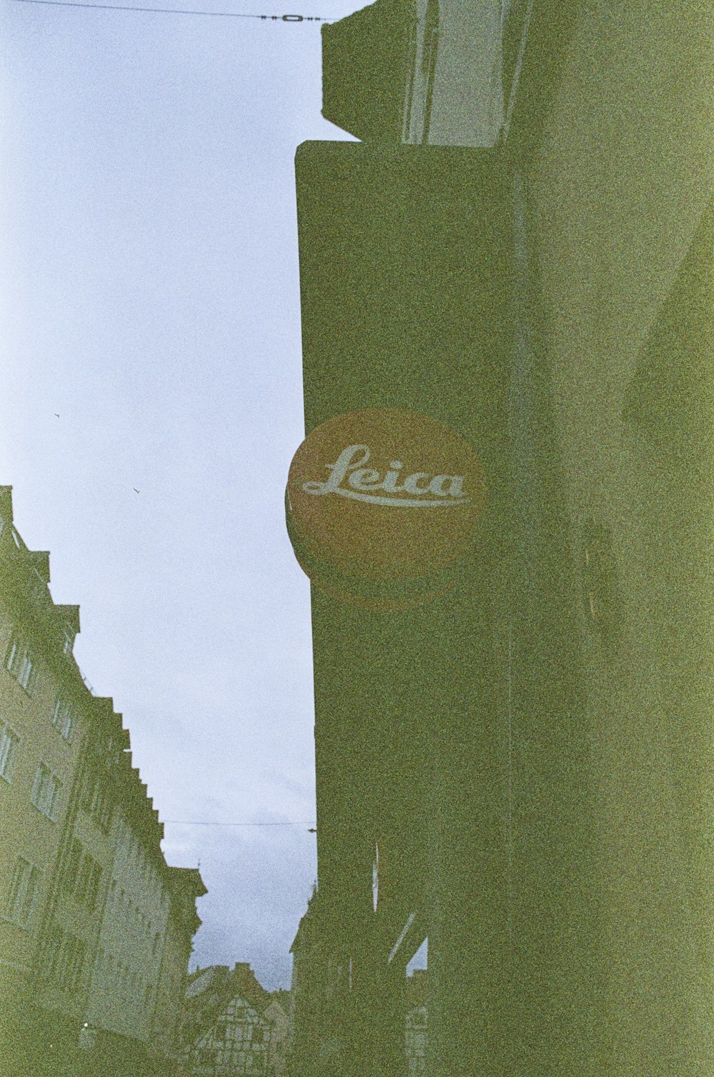 a leica sign on the side of a building