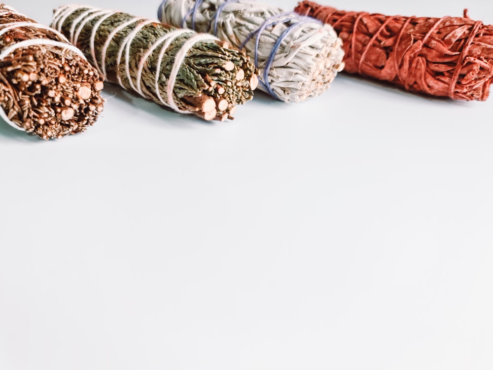 a white table topped with lots of different types of cones