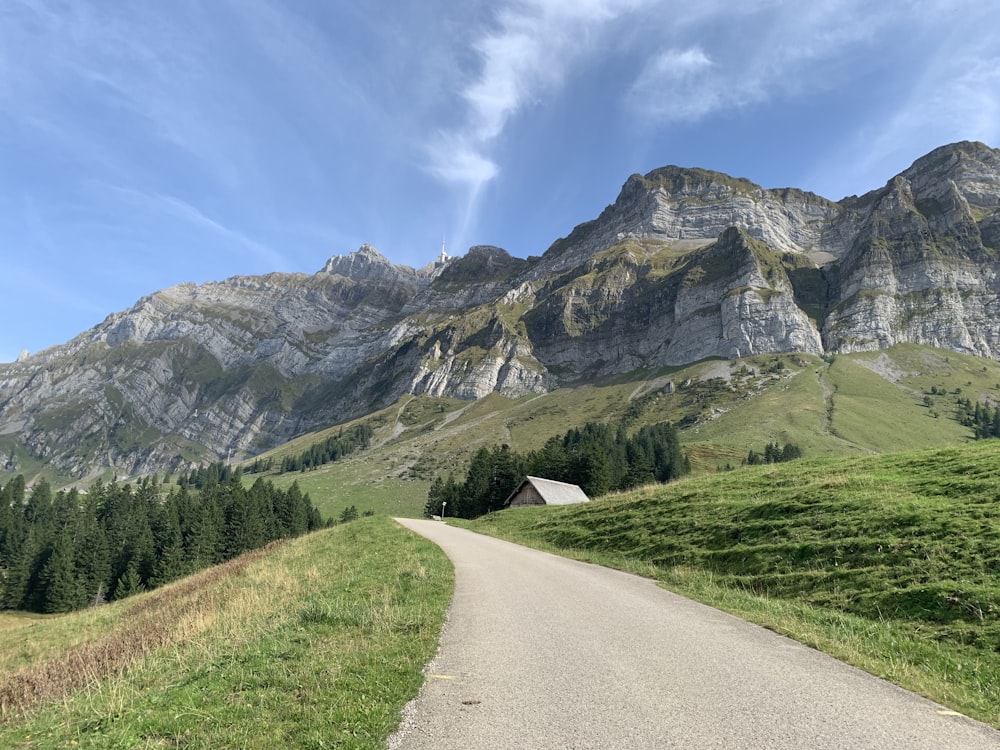 a dirt road in the middle of a mountain range