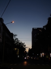 A public lighting installation in an urban area at dusk.