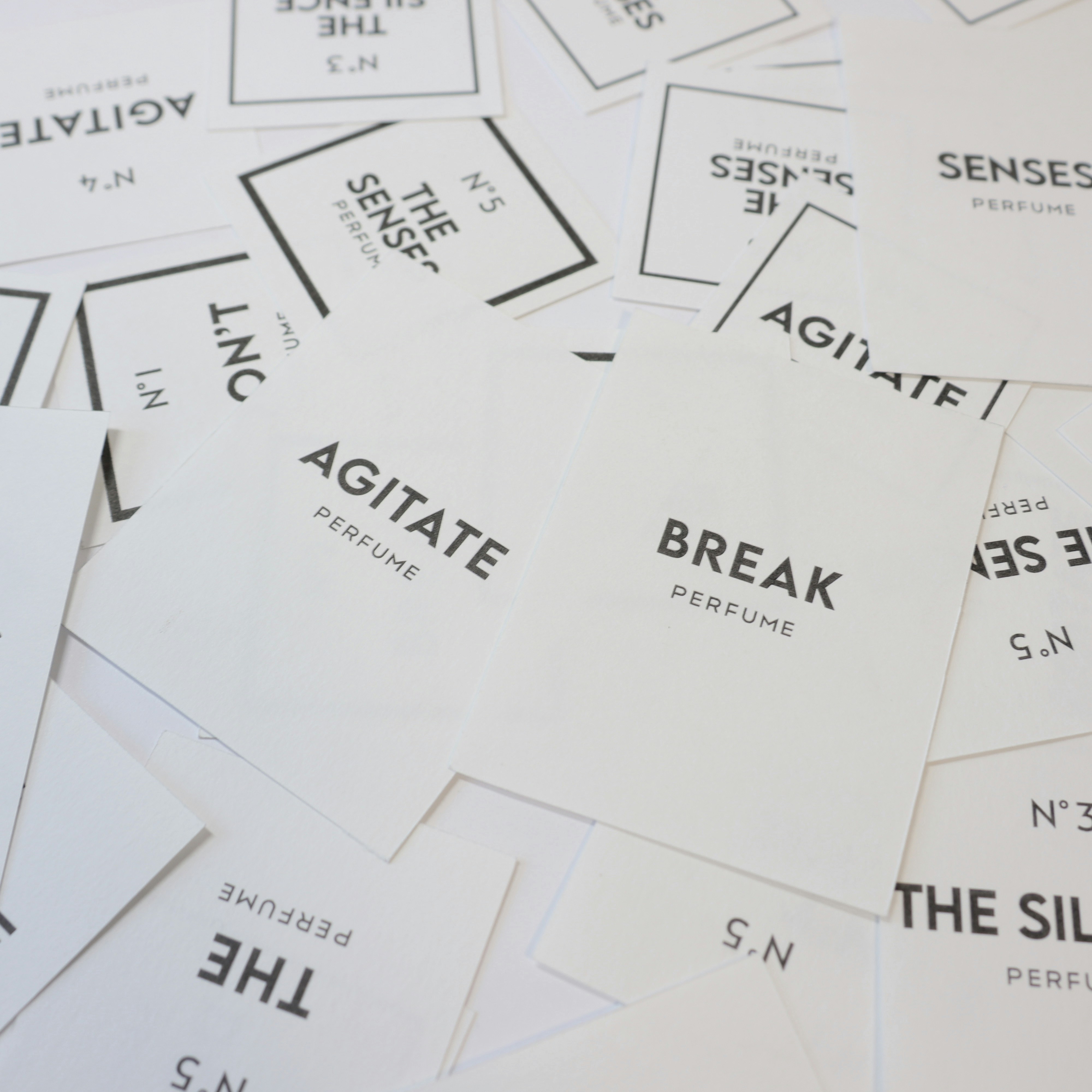 a pile of white papers with words on them