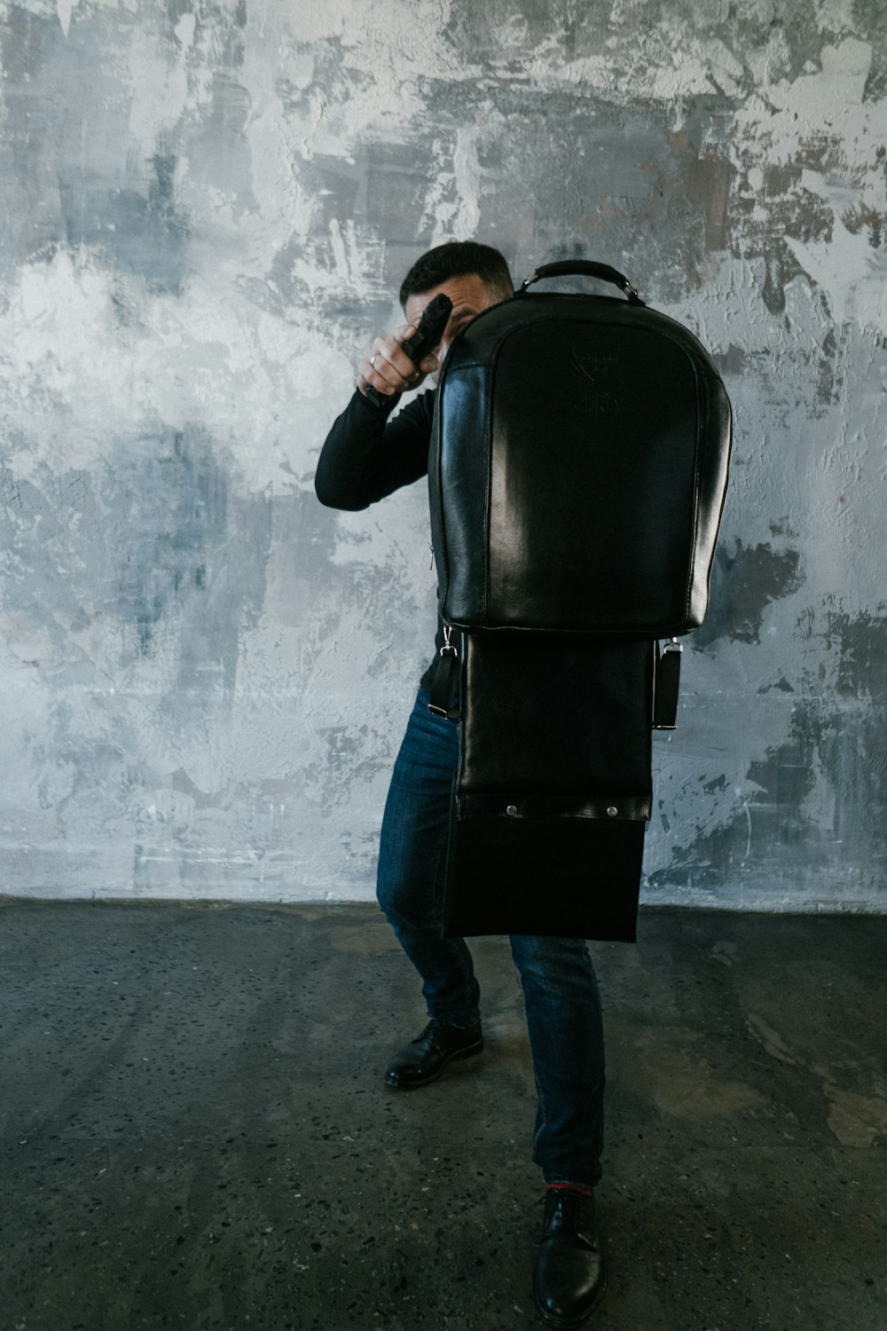 a man with a backpack on his back