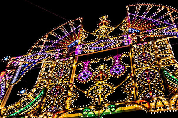 A stunning holiday light display featuring intricate designs and patterns.