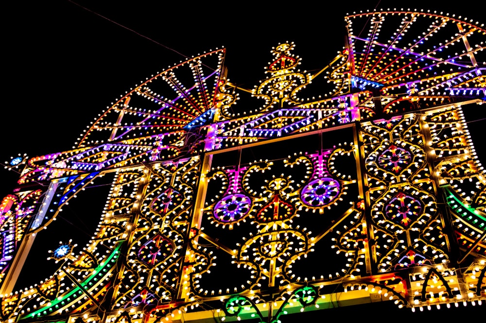 a large ferris wheel covered in christmas lights