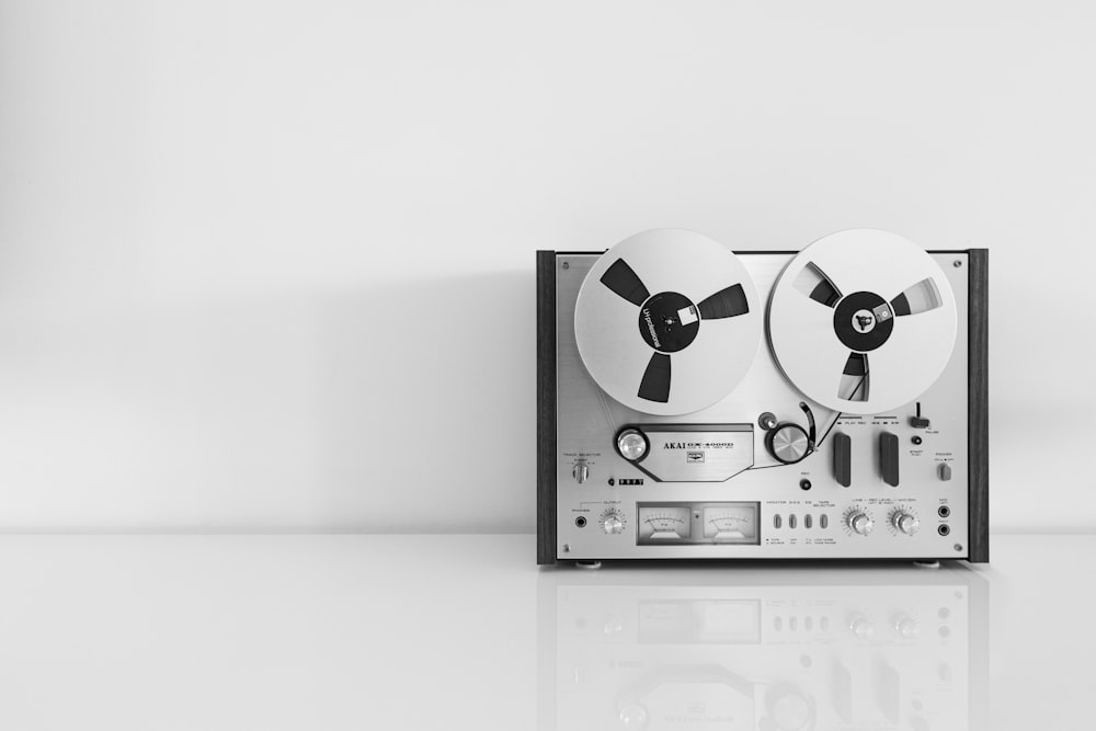 a black and white photo of a cd player