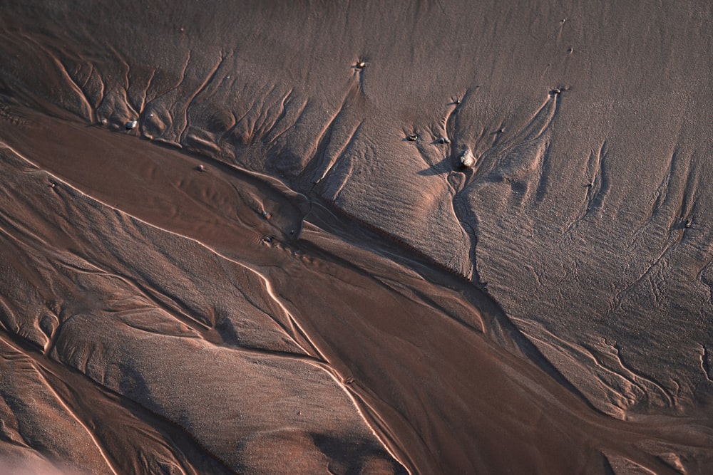 an aerial view of a desert with sand dunes