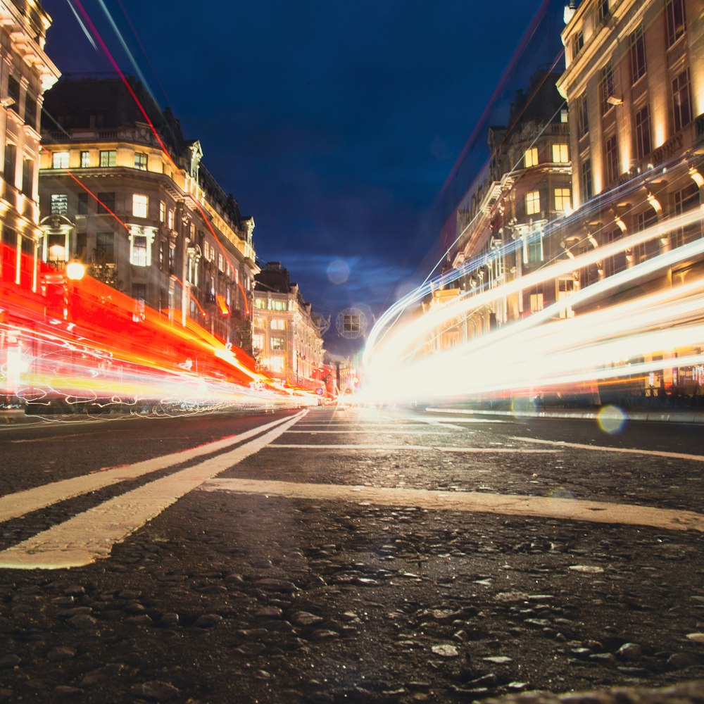 a blurry photo of a city street at night