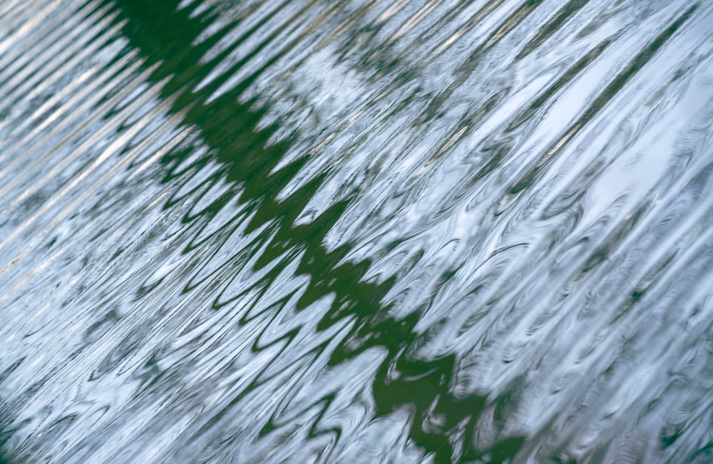 the reflection of a building in the water