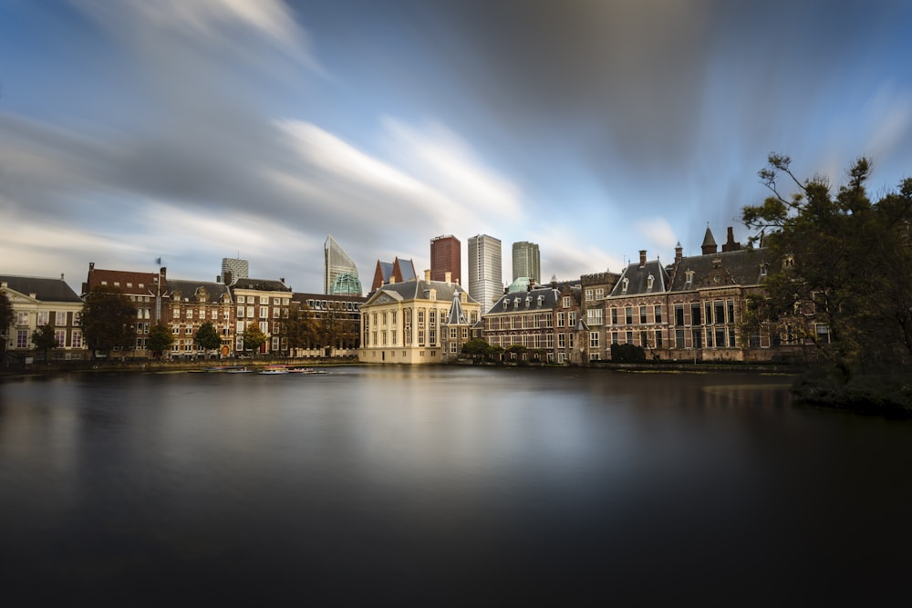 a large body of water surrounded by tall buildings