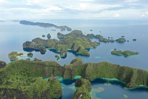 an aerial view of a group of islands in the ocean