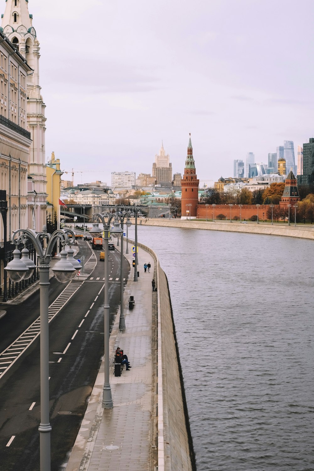 a view of a river and a city from a bridge