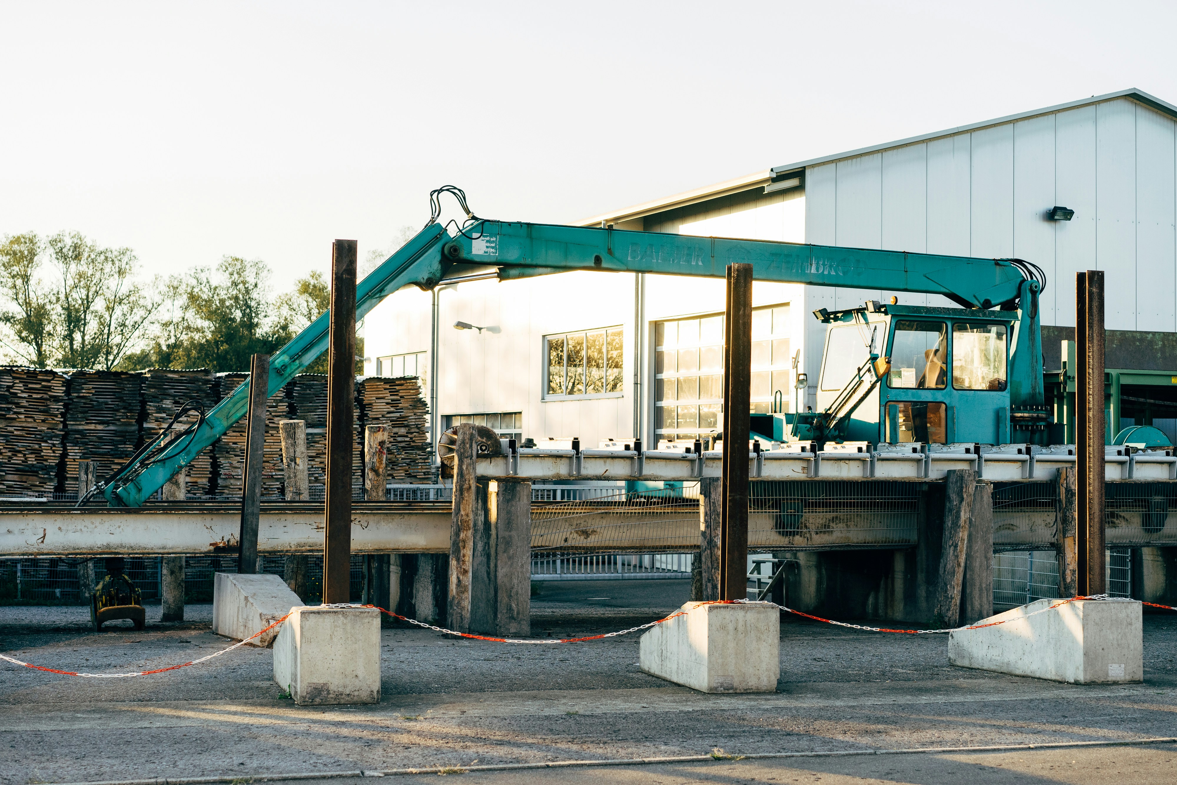 a large crane sitting next to a building