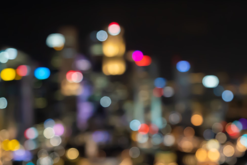 a blurry photo of a city at night