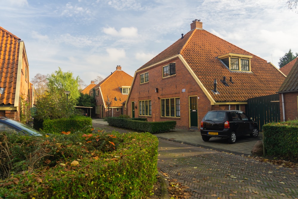 a car is parked in front of a house