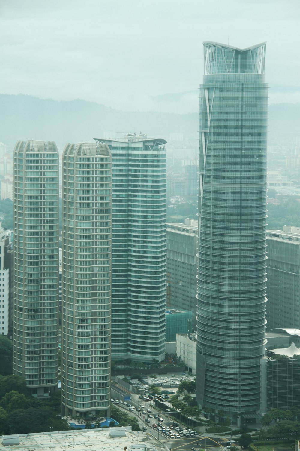 a large group of tall buildings in a city