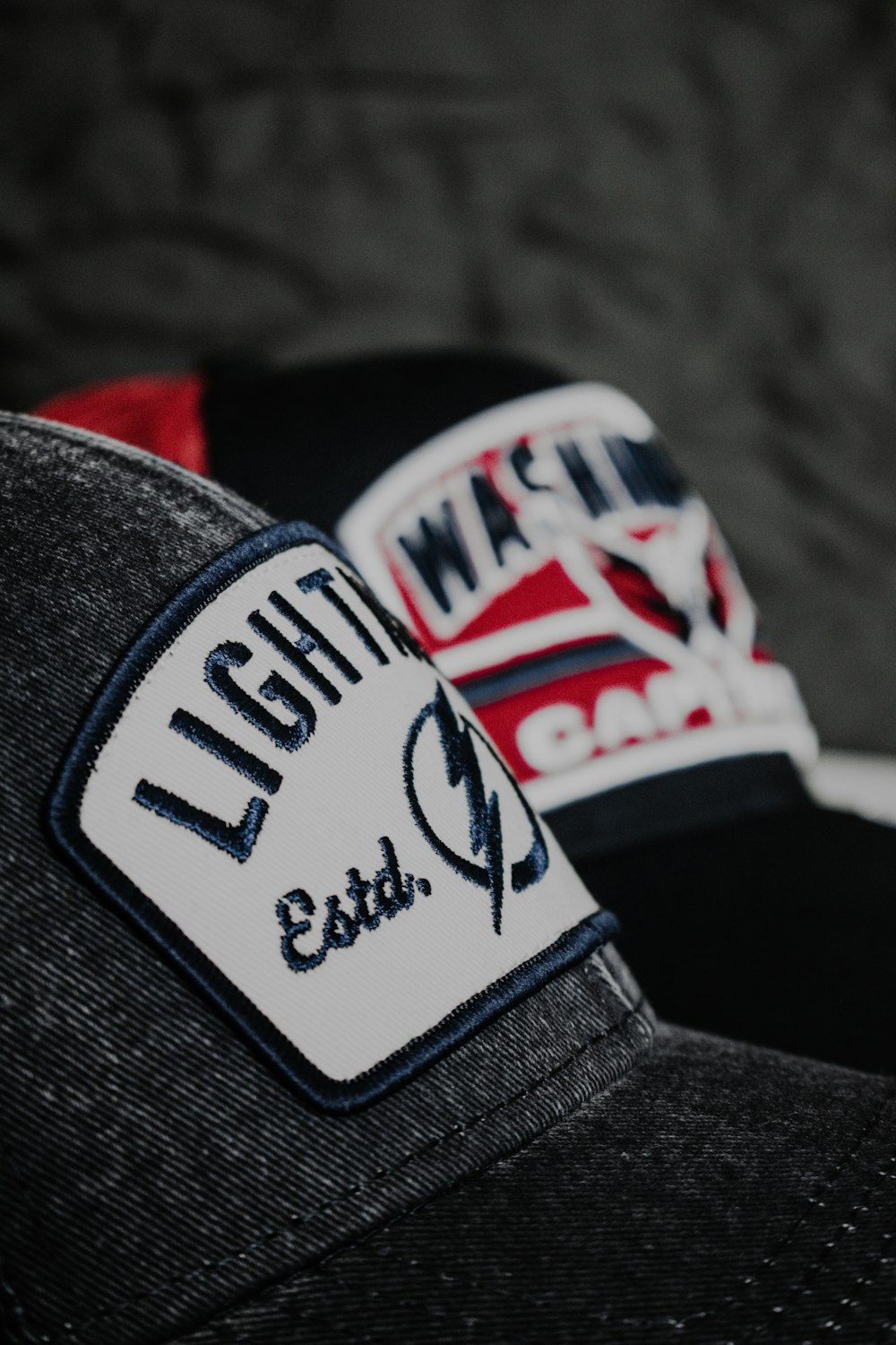 a close up of a hat with a patch on it