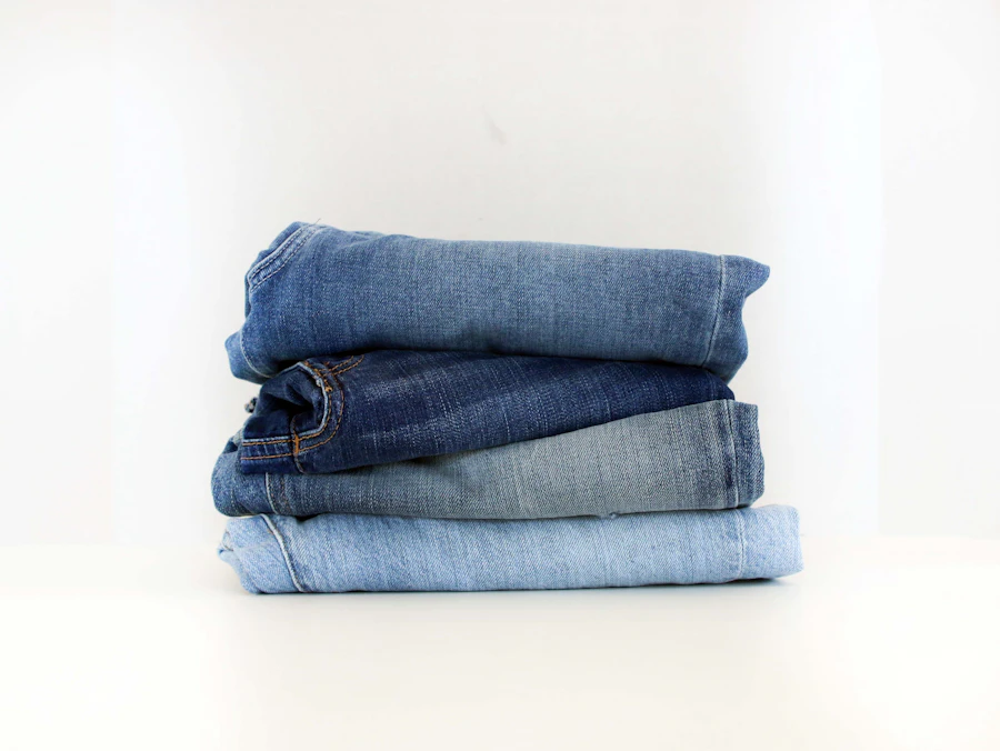 Stack of folded straight-fit indigo jeans