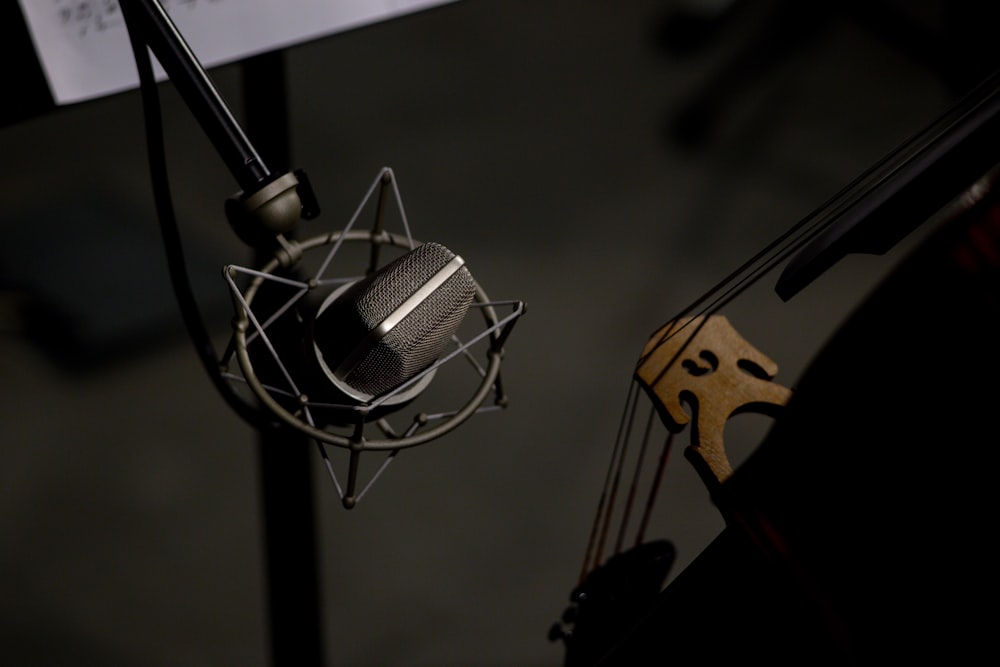a close up of a microphone and a guitar
