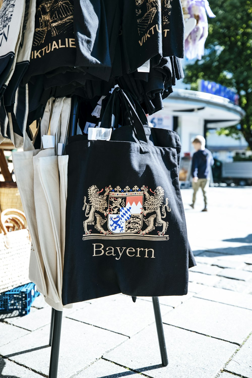 a black bag with a coat of arms on it