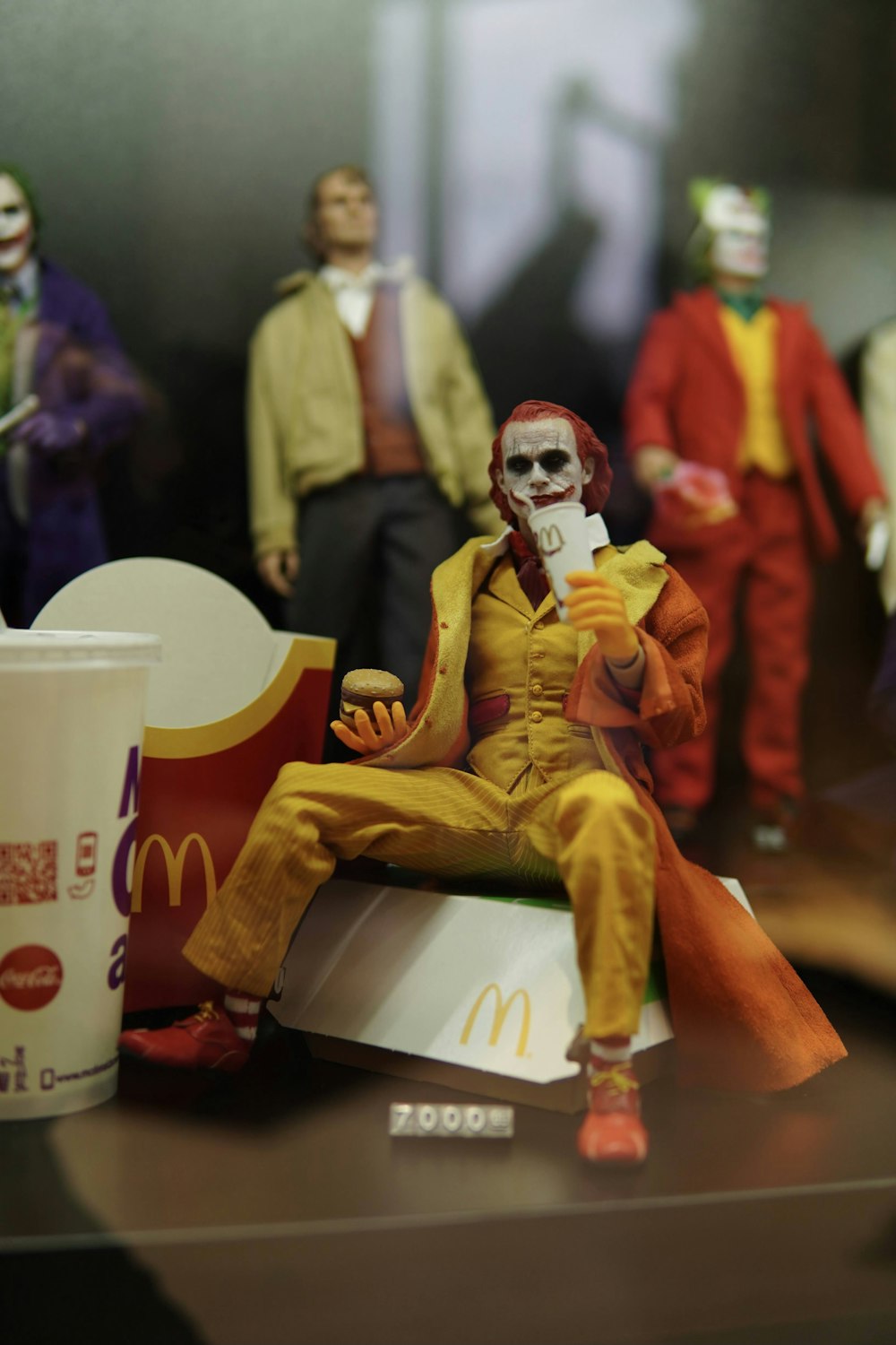 a group of toy figures sitting on top of a table