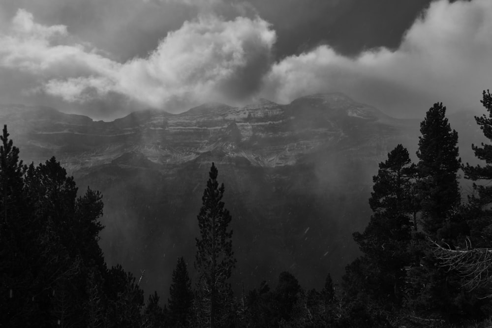 a black and white photo of a mountain range