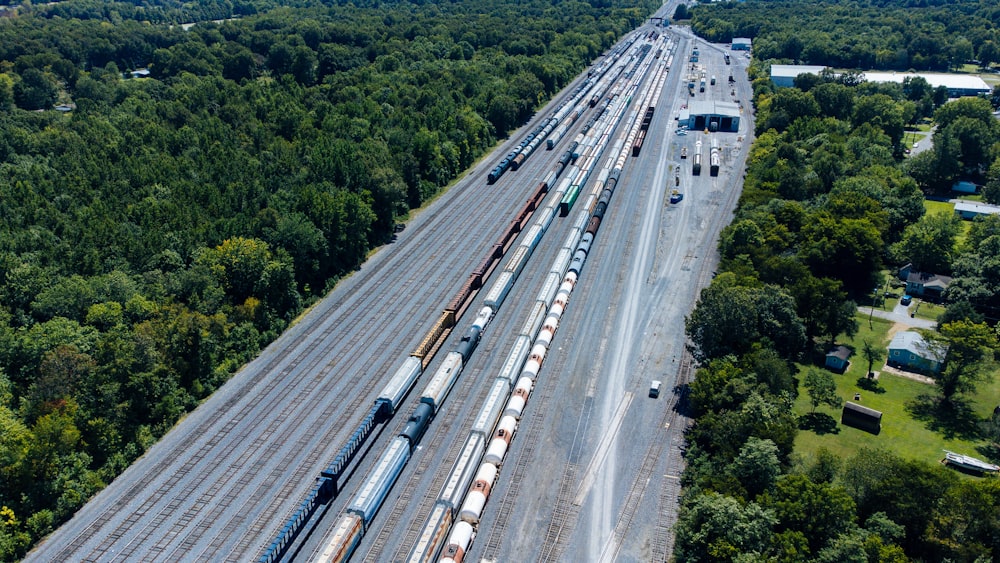 an aerial view of a train yard with many trains