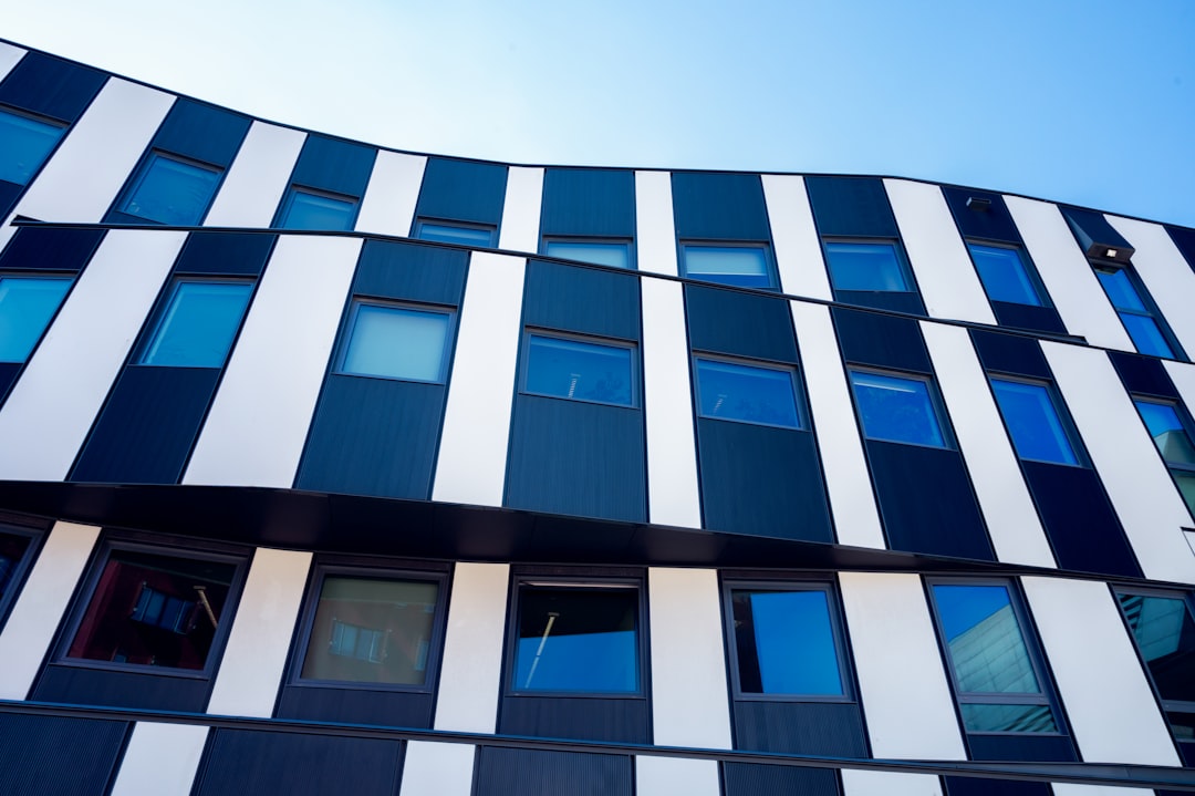a building that has a lot of windows on it, Student Center at the Vienna University of Economics and Business. Austria.