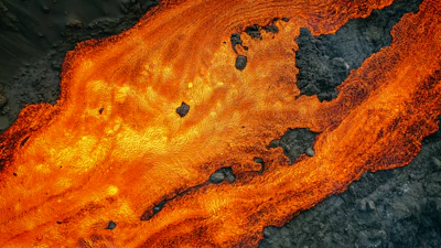 Bright glowing lava cracks forming the shape of a digital network.