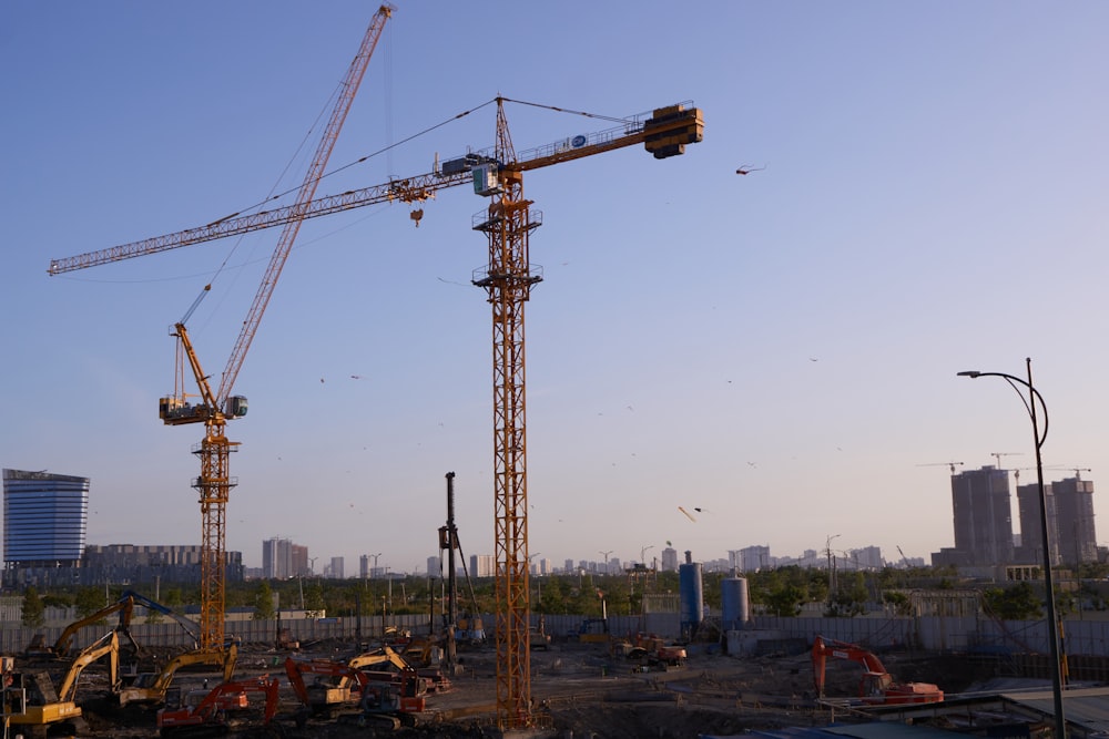 a construction site with cranes and other equipment