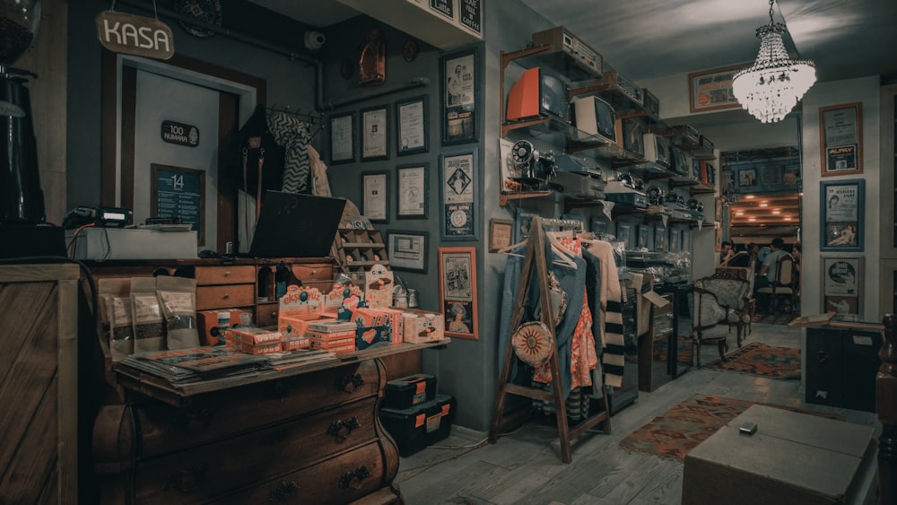 a room filled with lots of items and a chandelier