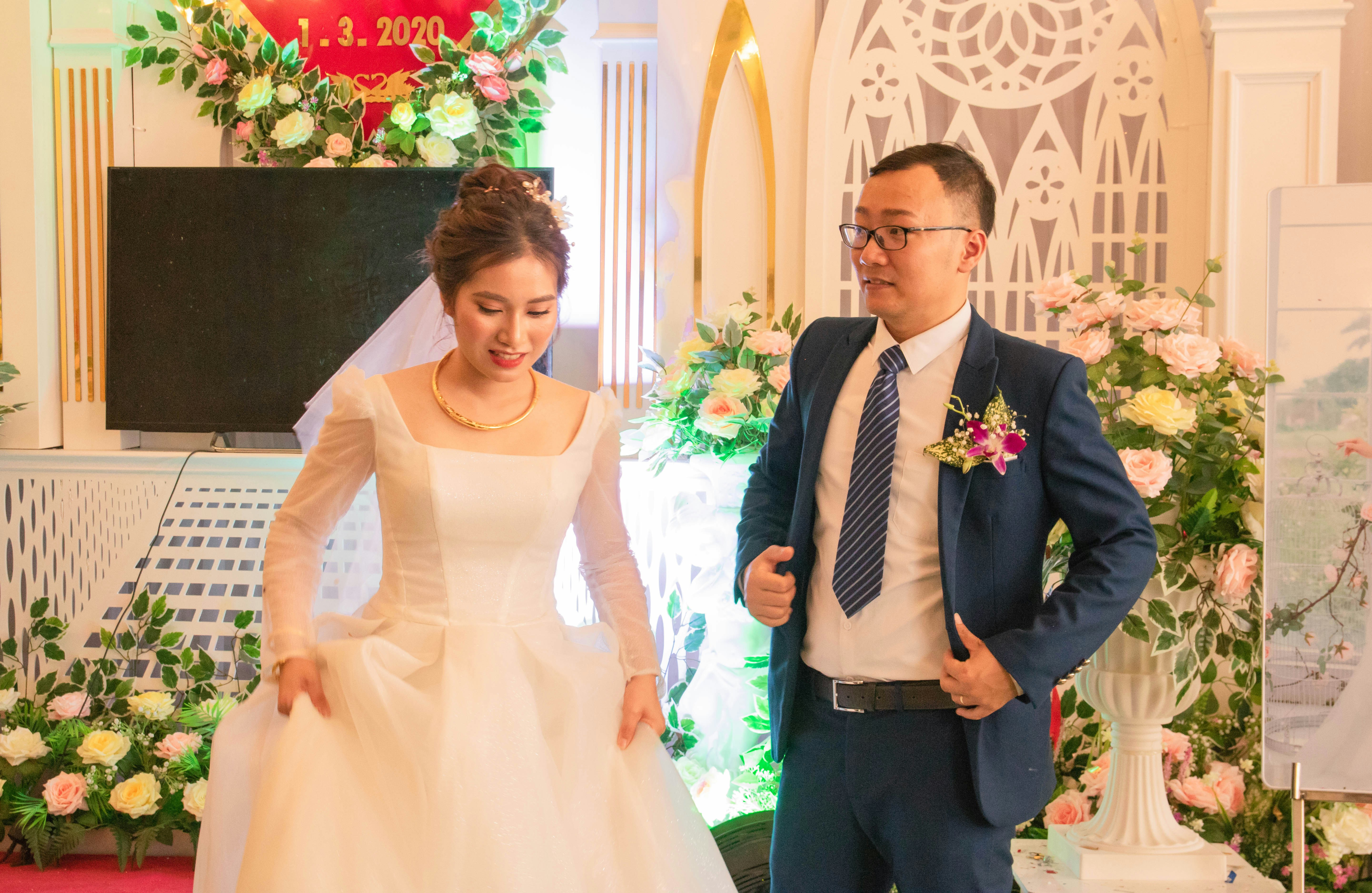 a man and a woman standing next to each other