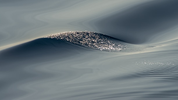 A serene ocean wave symbolizing guidance and clarity.