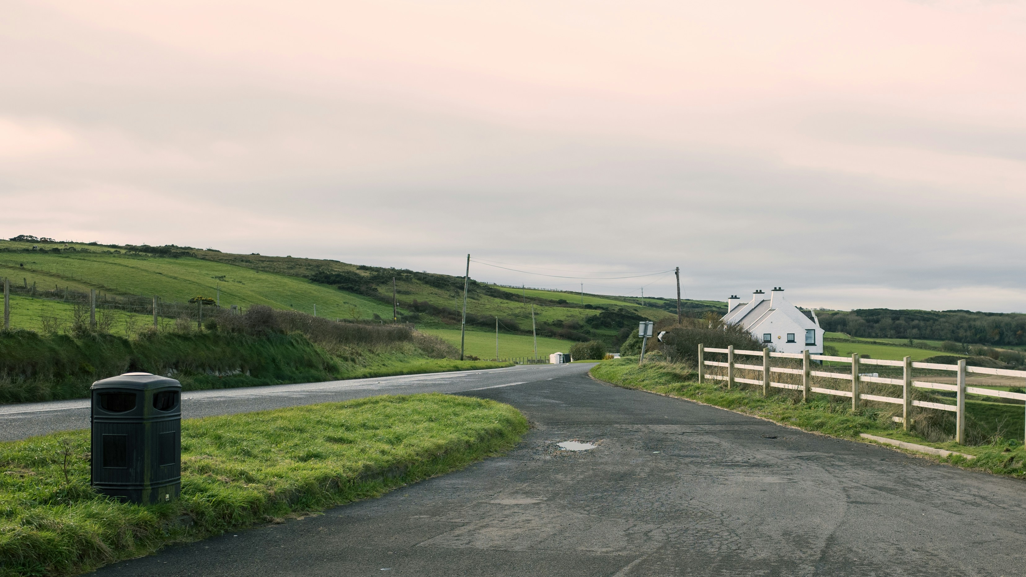 A rural road with a barn in the distance photo – Free Belfast Image on ...
