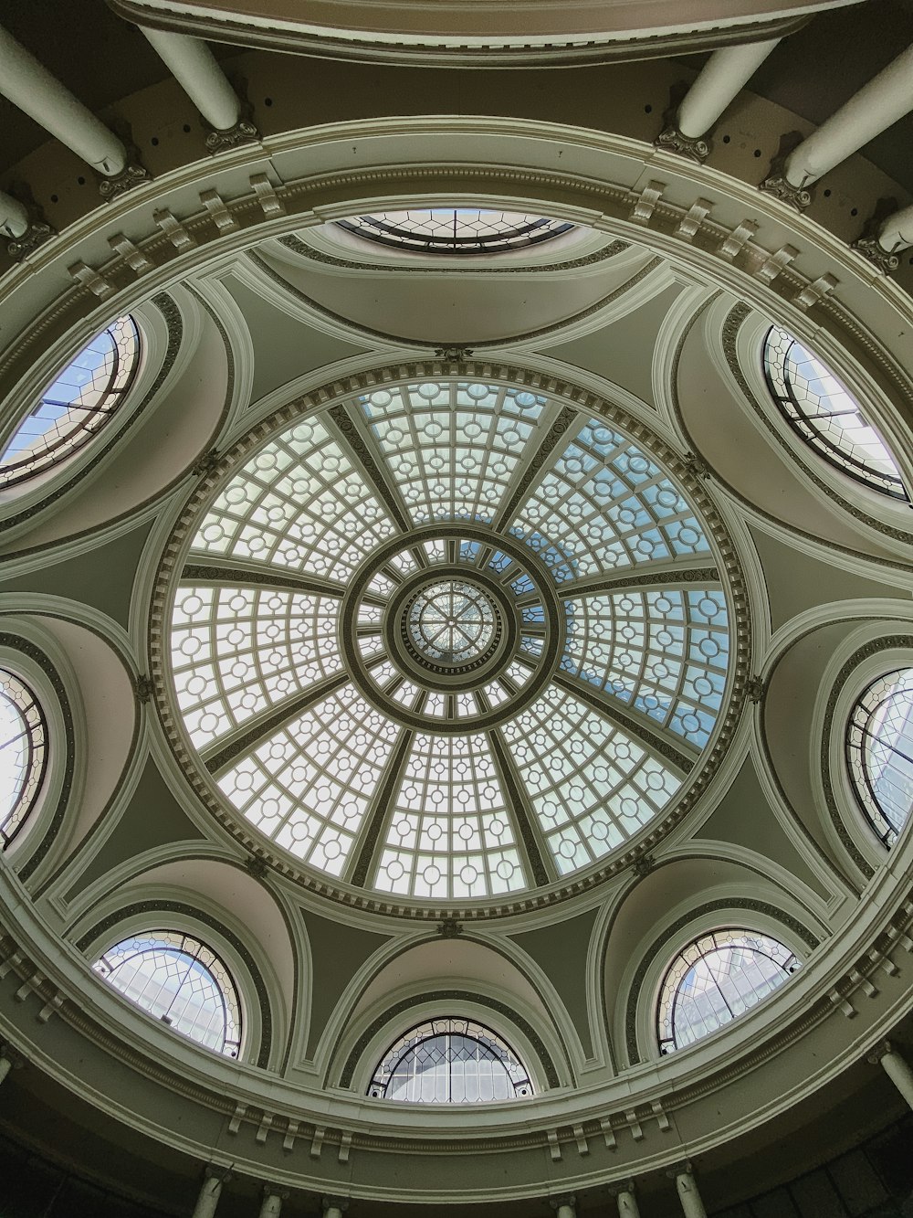 a circular glass ceiling in a building