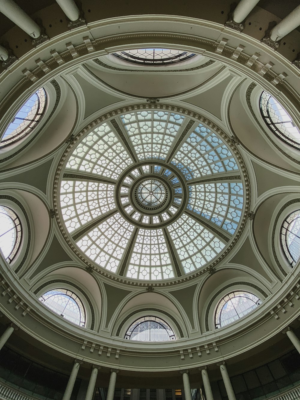 a large clock mounted to the side of a building