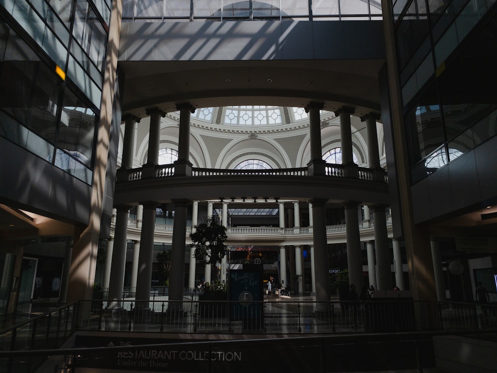 the inside of a large building with a lot of windows