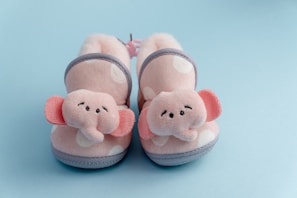 Cute booties with animal patterns perfect for little feet.