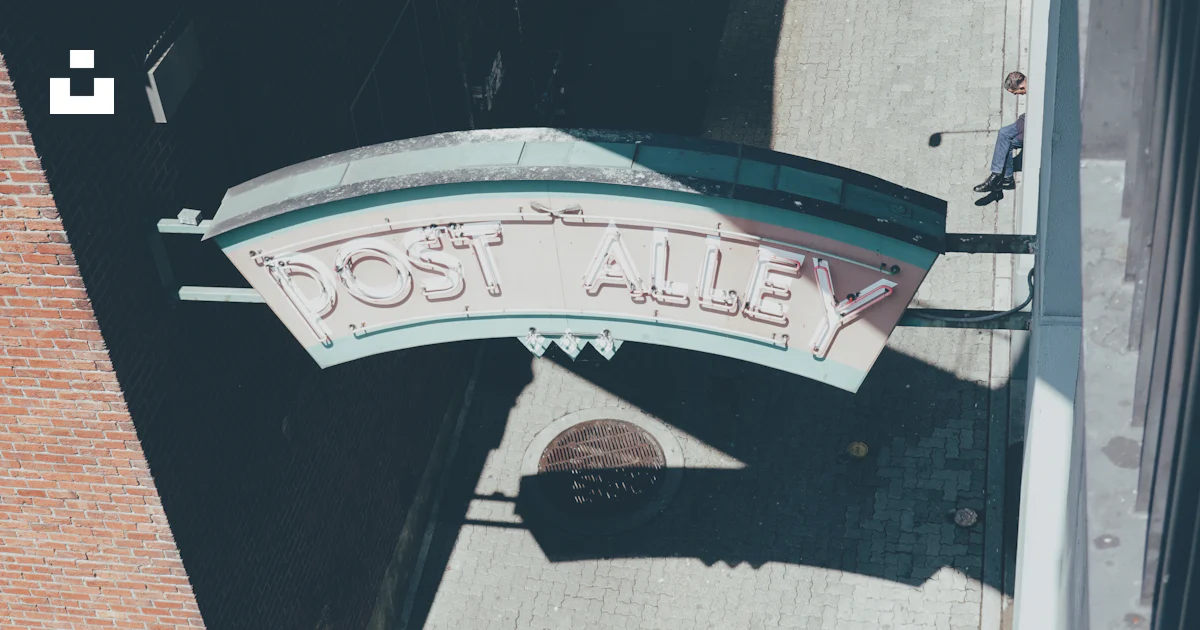 Post Alley Sign An overhead view of a post alley sign photo – Free Seattle Image on ...
