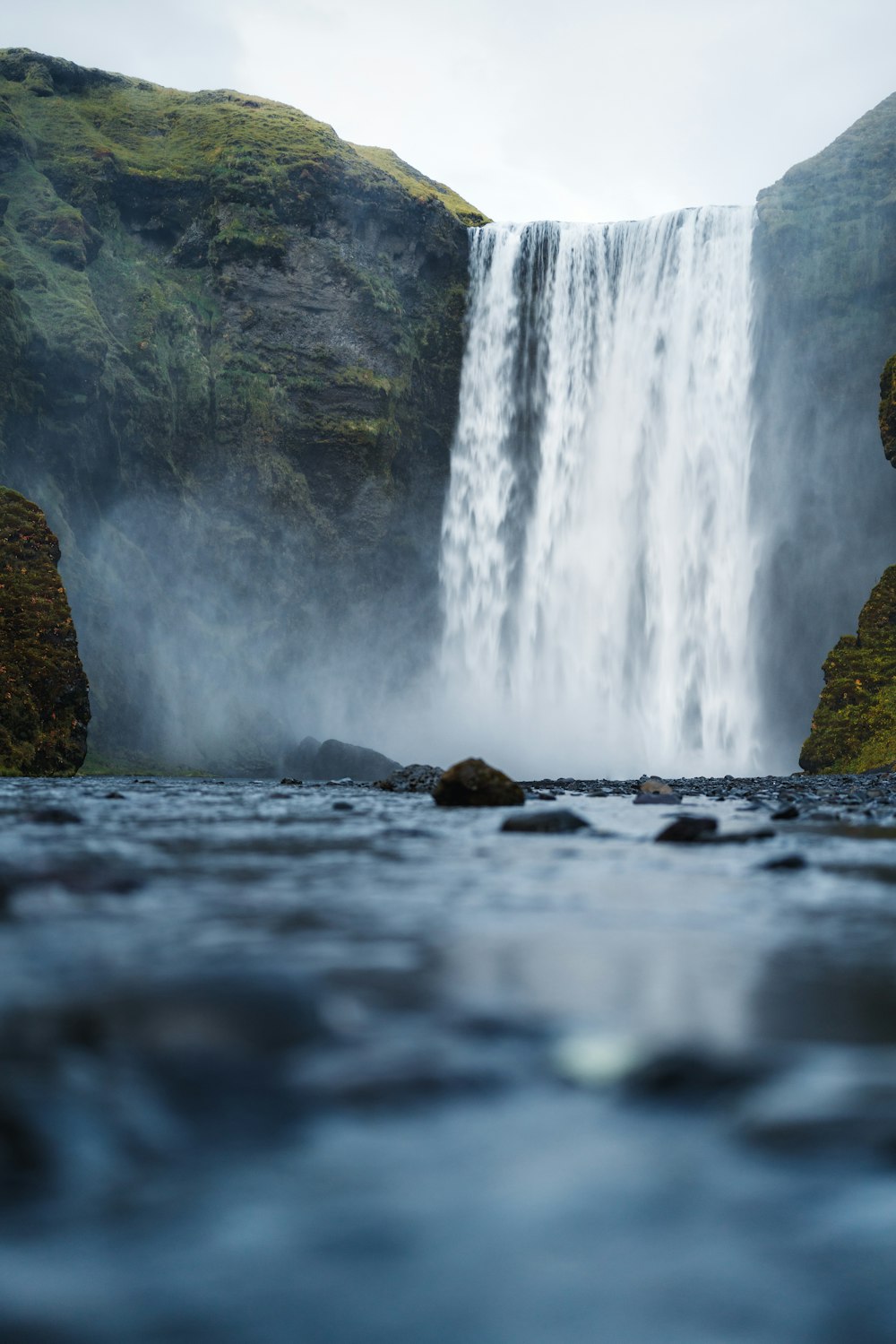 a waterfall with a large amount of water coming out of it