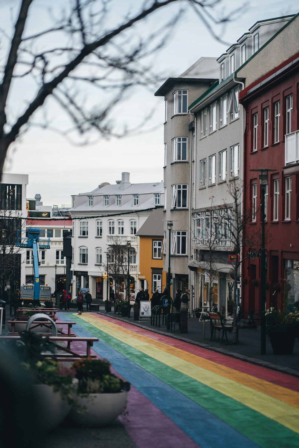 a rainbow painted street in a city