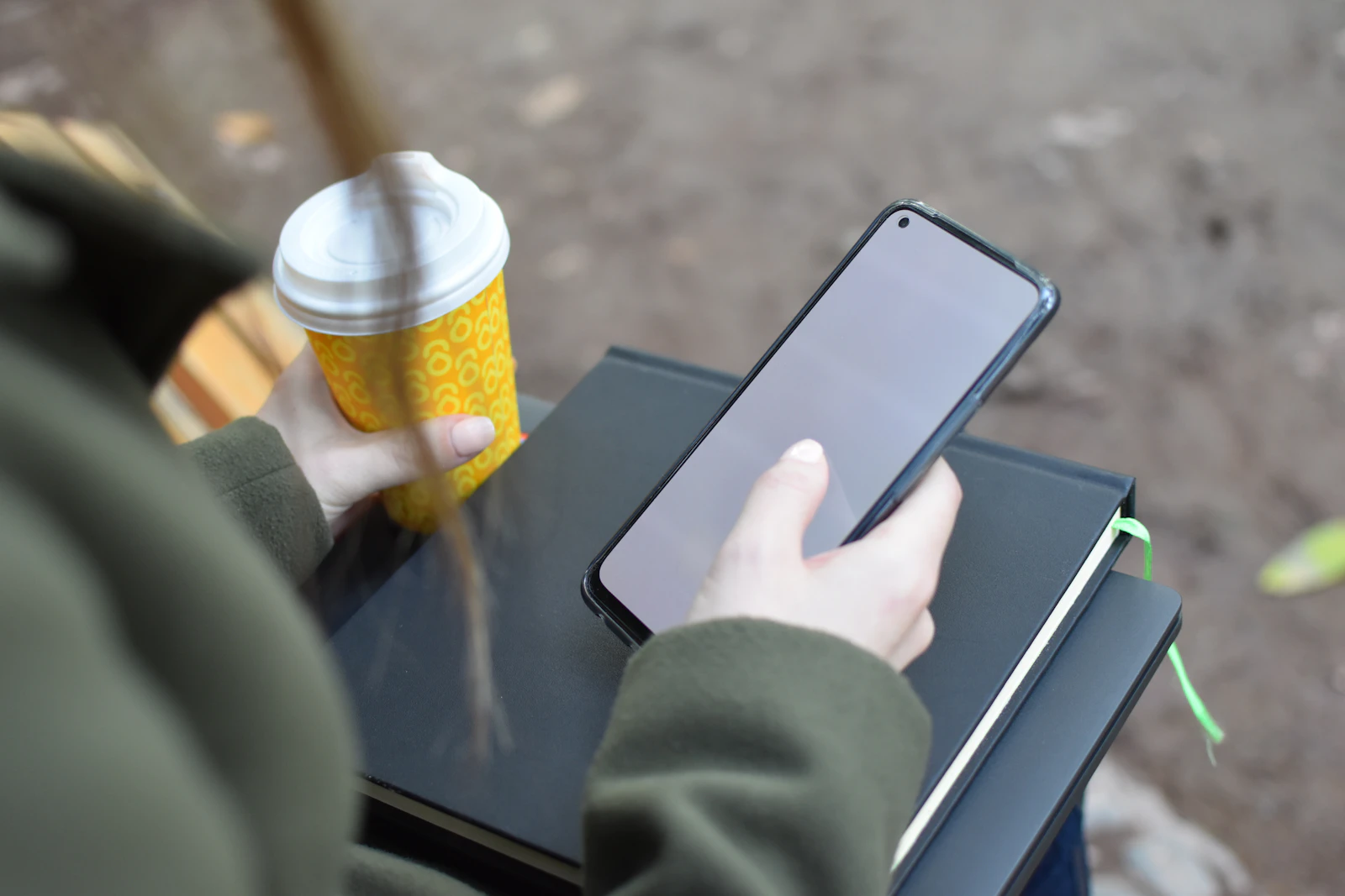 Person using a phone during some spare time at home