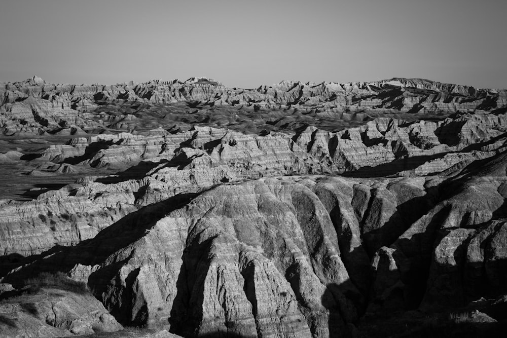 a black and white photo of a rocky landscape