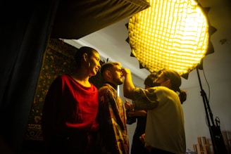 a group of people that are standing in a room